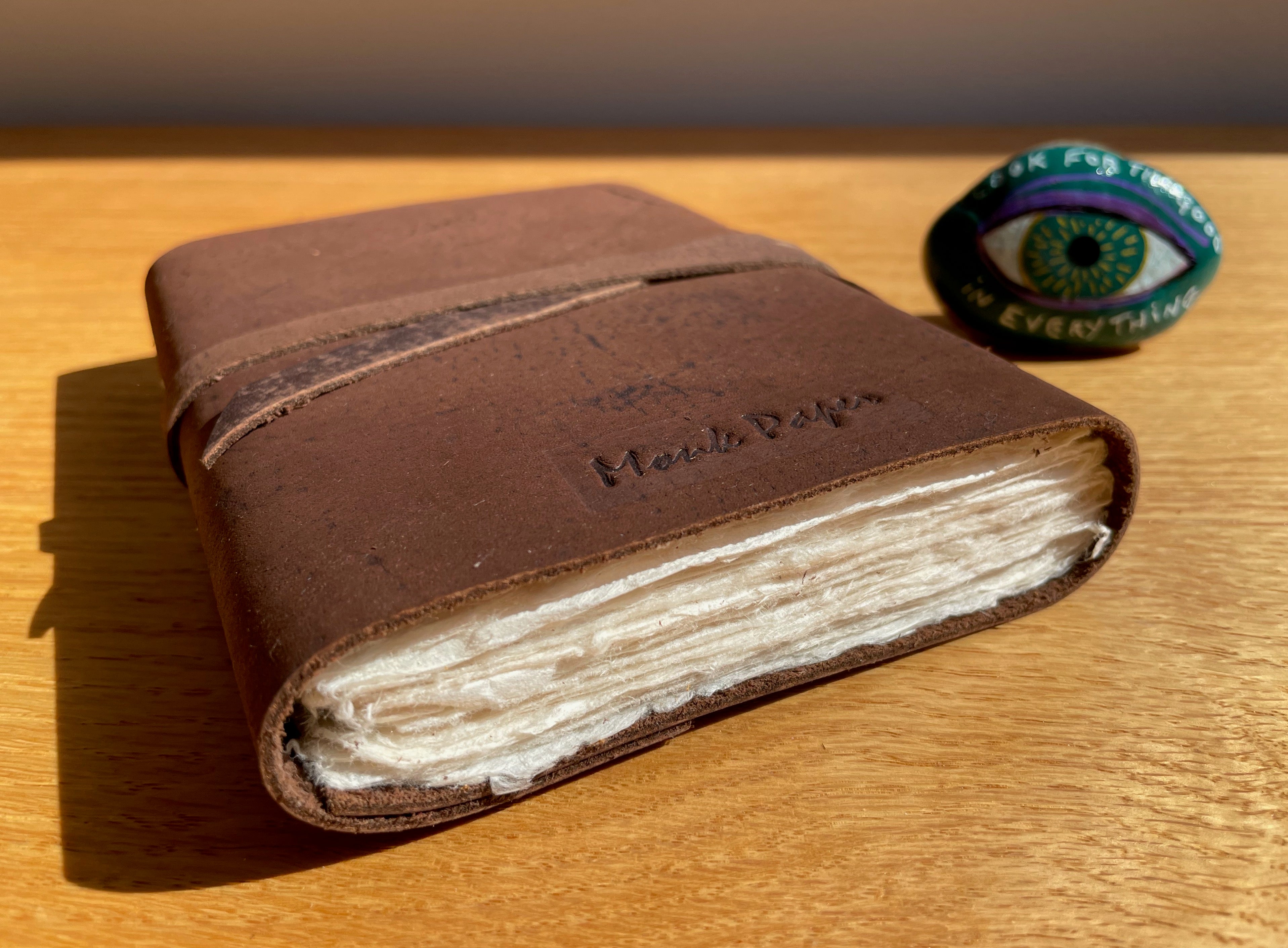 Monk Paper Buffalo Leather Journal with "Look for the Good in Everything" painted rock